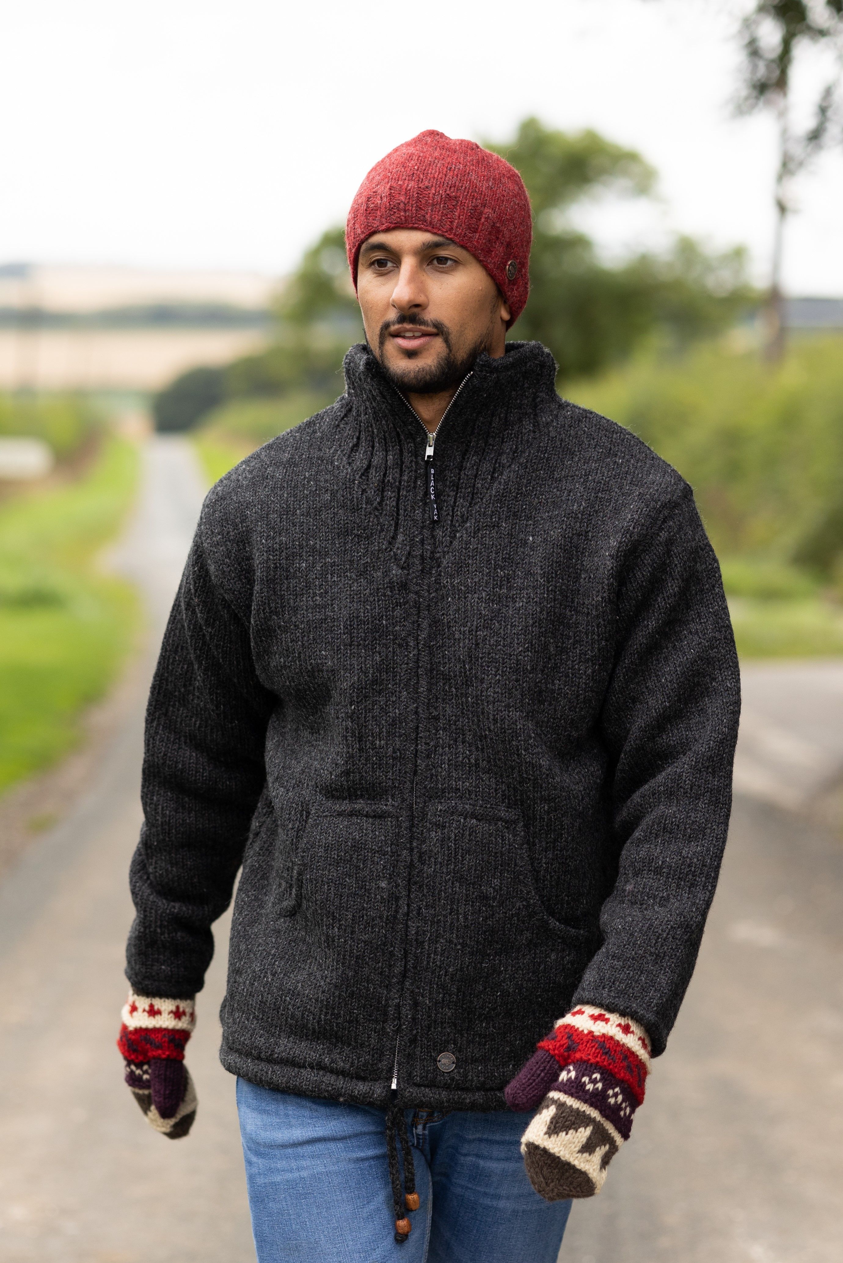 Classic, charcoal fully lined jacket worn with red pepper beanie and patterned mittens